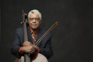Color photo of Rufus Reid with his bass.