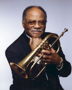 Color photo of Clark Terry holding his