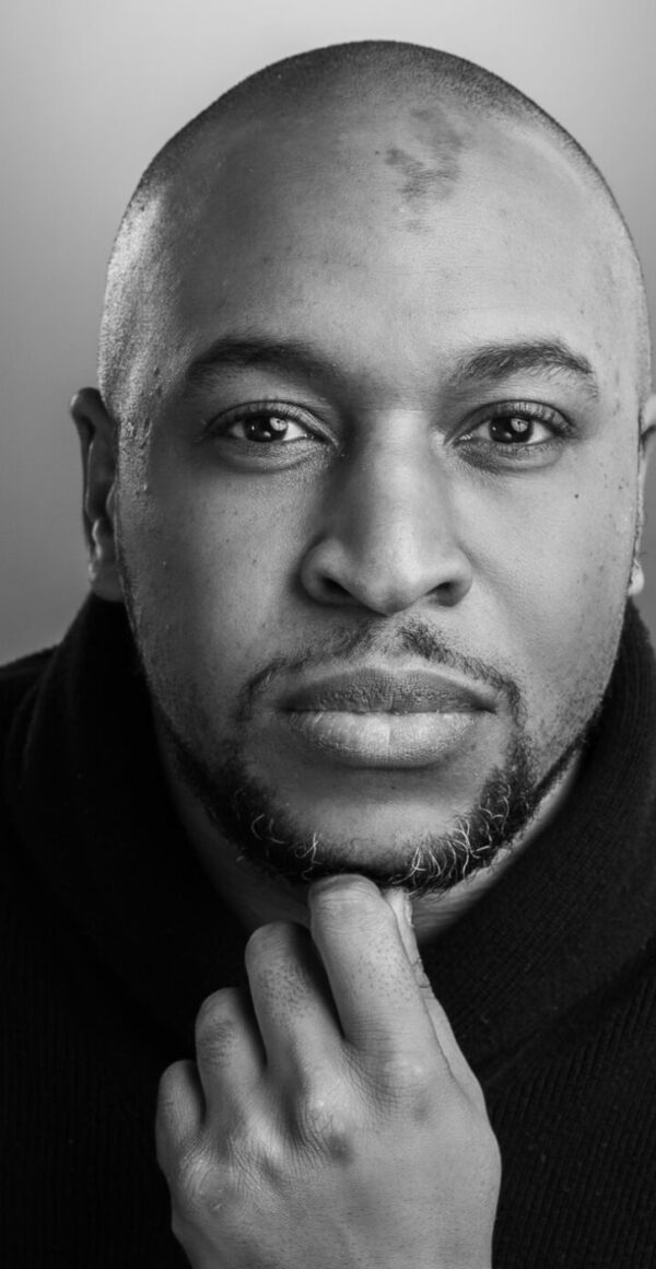 Black and white headshot of Aaron Myers.